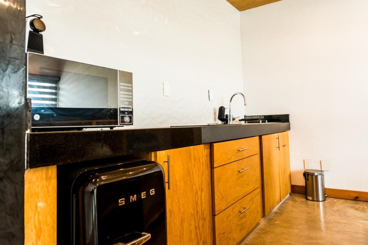 Casa Ticul Hotel Boutique - 5Th Ave (Adults Only) Playa del Carmen Exterior photo A kitchen with a refrigerator, stove, and oven