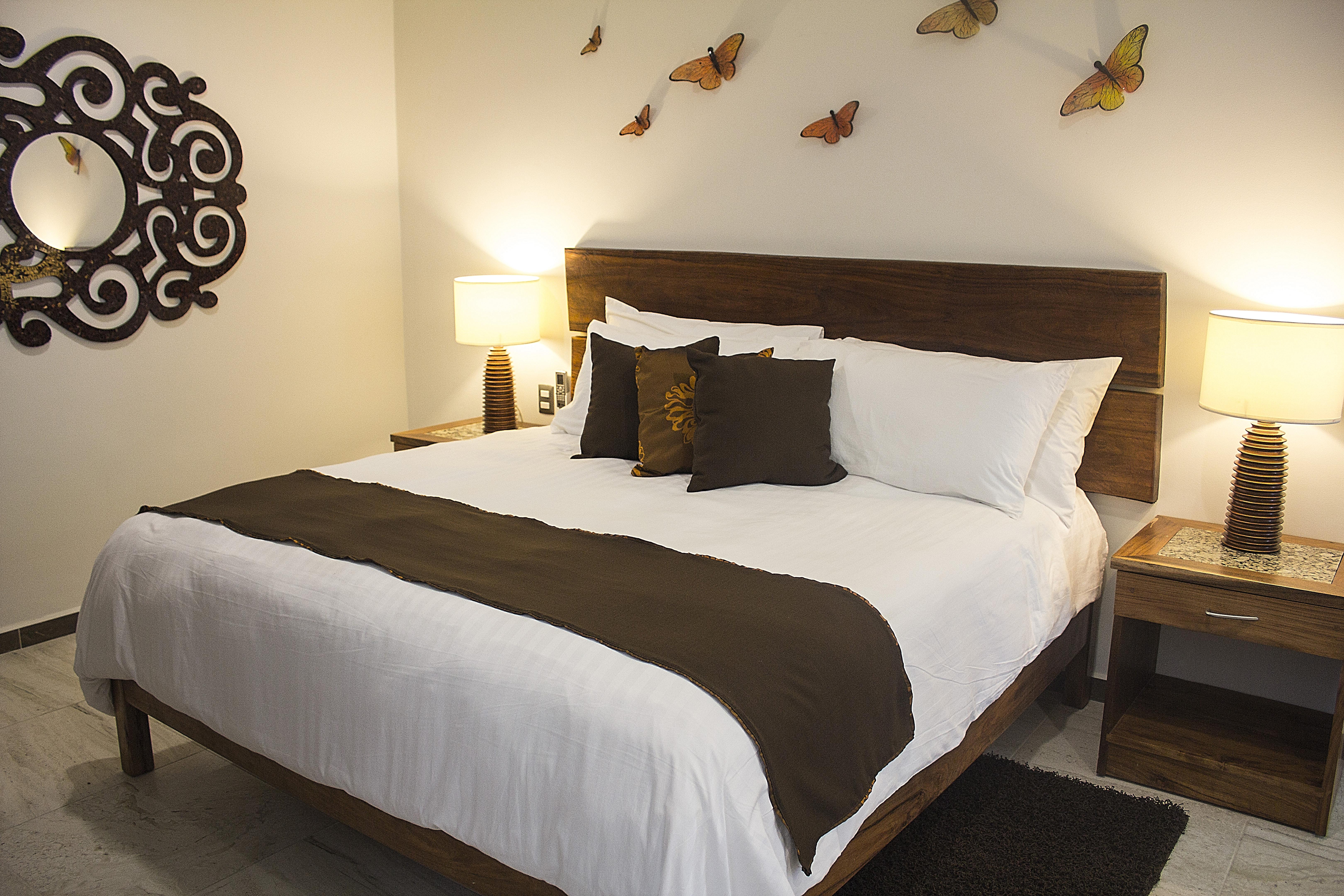 Casa Ticul Hotel Boutique - 5Th Ave (Adults Only) Playa del Carmen Exterior photo A bed with a bed runner