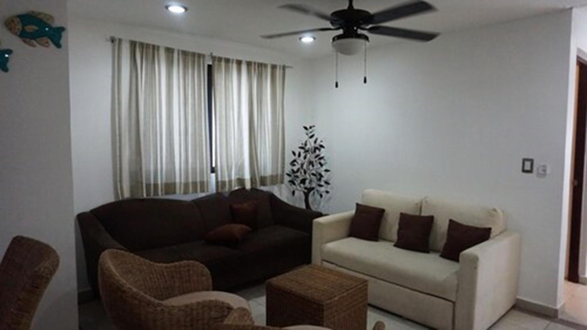 Casa Ticul Hotel Boutique - 5Th Ave (Adults Only) Playa del Carmen Exterior photo A living room with a ceiling fan